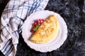 Sweet omelette with clotted cream and currant Royalty Free Stock Photo