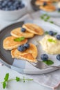 Pancake porridge, mini pancakes in a bowl with maple syrup Royalty Free Stock Photo