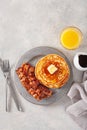 Sweet pancakes with butter and bacon. traditional american breakfast Royalty Free Stock Photo