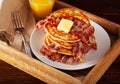 sweet pancakes with butter and bacon. traditional american breakfast Royalty Free Stock Photo