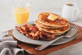 sweet pancakes with butter and bacon. traditional american breakfast Royalty Free Stock Photo