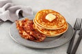 sweet pancakes with butter and bacon. traditional american breakfast Royalty Free Stock Photo