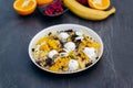 Sweet pancakes with ice cream, chocolate and orange served on white plate. Healthy and tasty breakfast Royalty Free Stock Photo