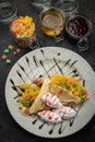 Sweet pancakes with ice cream and fruits Royalty Free Stock Photo
