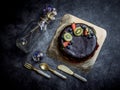 Sweet pastry dessert chocolate cake with strawberry, kiwi and bl Royalty Free Stock Photo