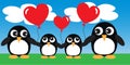 A sweet penguin family with balloons Royalty Free Stock Photo