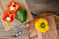 Sweet pepper on wood background, paprika, red, green and yellow sweet bell peppers Royalty Free Stock Photo