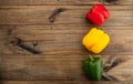 Sweet pepper on wood background, paprika, red, green and yellow sweet bell peppers on table Royalty Free Stock Photo