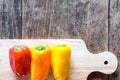 3 Sweet Peppers on Chopping Block with space for text