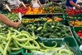 Sweet peppers, cucumbers, zucchini, tomatoes and other vegetables and fruits are sold at the seasonal farmers market in Royalty Free Stock Photo