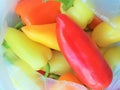 Sweet peppers different colors in a transparent package Royalty Free Stock Photo