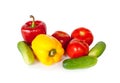 Sweet peppers, tomatoes and green cucumbers isolated on a white Royalty Free Stock Photo