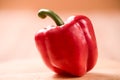 Sweet peppers on a wooden background