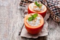 Sweet persimmons stuffed with cottage cheese and almonds on woo