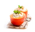 Sweet persimmons stuffed with cottage cheeseand almonds isolat