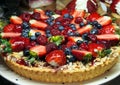 Sweet pie with fresh strawberries, blueberries and raspberries Royalty Free Stock Photo