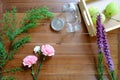 Sweet Pink and Purple flowers with glass jar on wood table background Royalty Free Stock Photo