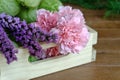 Sweet Pink and Purple Flowers on wood table