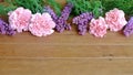 Sweet Pink and Purple Flowers on wood table