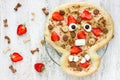 Sweet pizza in the form of funny skull to treat kids at Halloween