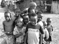 Sweet playful cheeky African children smiling for first photo Royalty Free Stock Photo