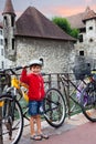 Sweet portrait of preschool boy in the town of Annecy, France, s