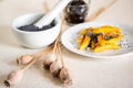 Sweet potato dumpling wedges with poppy seeds, plum jam and mortar Royalty Free Stock Photo