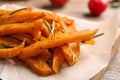 Sweet potato fries on wooden board Royalty Free Stock Photo