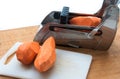 Sweet potato in a fry cutter Royalty Free Stock Photo