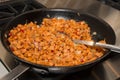 Sweet potato garnish in stir fry pan