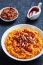 Sweet potato mash in a bowl, vertical view Royalty Free Stock Photo