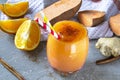 Sweet Potato Smoothie coctail with orange, Cinnamon and ginger. Vitamin, healthy food concept. Copy space