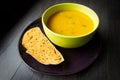 Sweet potato sourdough bread slice and hokkaido pumpkin soup bowl Royalty Free Stock Photo