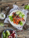 Sweet potato wrap. Delicious vegetarian snack. On a wooden rustic table Royalty Free Stock Photo