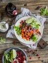 Sweet potato wrap sandwich and beer. Delicious vegetarian snack. On a wooden rustic table Royalty Free Stock Photo