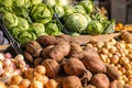 Sweet potatoes and cabbage, at farmers market, fresh and healthy Royalty Free Stock Photo