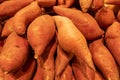 Sweet Potatoes on Display in a Market Royalty Free Stock Photo