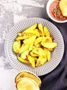 Sweet potatoes with greens and ketchup close - up on the table Royalty Free Stock Photo