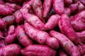 Sweet potatoes on a market stall Royalty Free Stock Photo