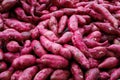 Sweet potatoes on a market stall Royalty Free Stock Photo