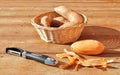 Sweet potatoes and peeler. Royalty Free Stock Photo