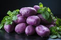 Sweet purple potatoes on a dark table