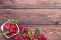 Sweet raspberries with green leafs Royalty Free Stock Photo