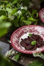 Sweet ravioli of bird-cherry flour with ricotta and berries