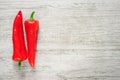 Sweet red Kapia peppers on a white wood background Royalty Free Stock Photo