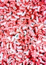 sweet red and white candy teeth as background Royalty Free Stock Photo