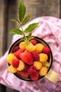 Sweet red and yellow raspberries Royalty Free Stock Photo