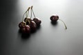 Sweet ripe cherries. Fresh cherry on black background. Farming abundance