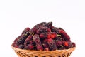 Sweet ripe mulberry in brown basket on white background healthy mulberry fruit food isolated Royalty Free Stock Photo