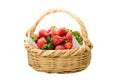 Sweet ripe strawberries in straw basket isolated on white Royalty Free Stock Photo